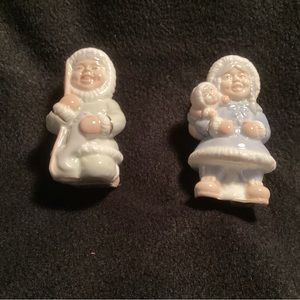 Two Porcelain Alaska Figurines. NIB.